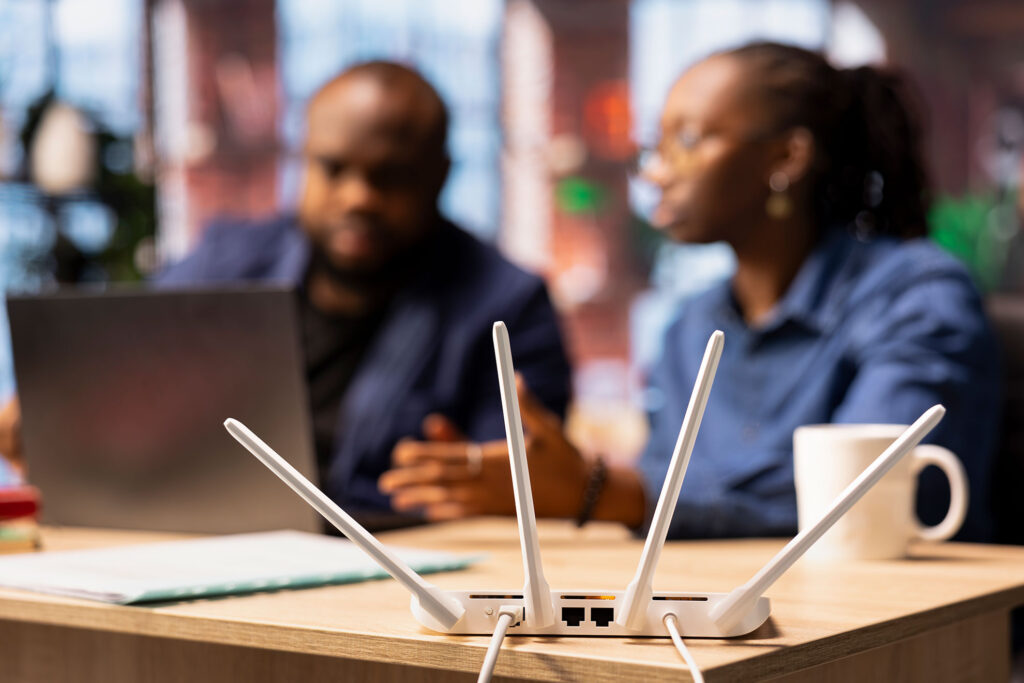 african-american-couple-home-office-troubleshooting-their-wi-fi-router
